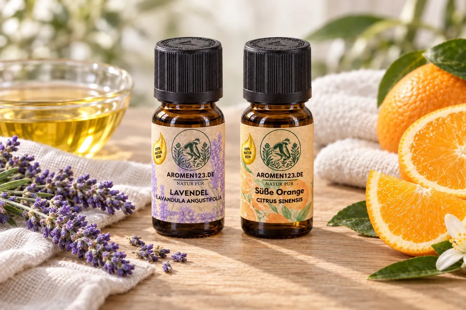 Lavendel und Orange süß – die beiden ätherischen Öle des Feierabend-Duos mit Lavendelblüten, Orangen und einem Leinentuch